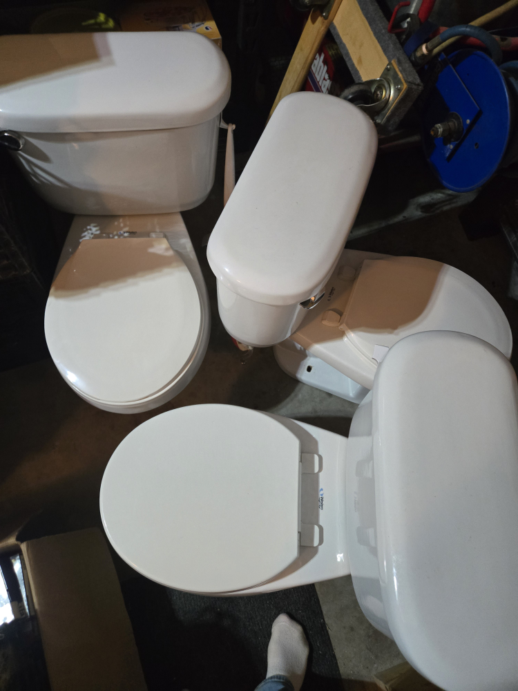 2 White  Toilets