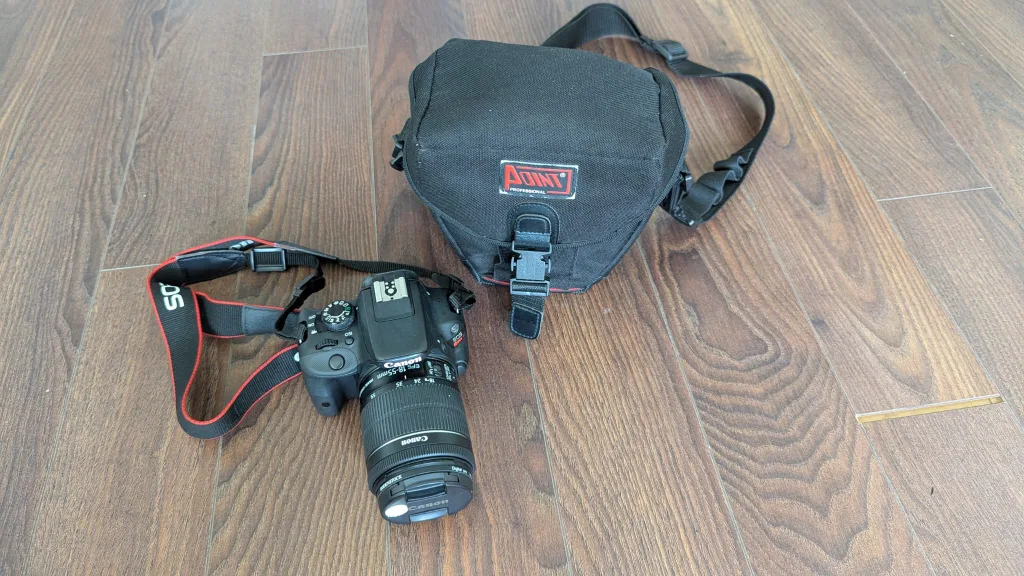 Canon EOS Rebel SL1 DSLR Camera + 18–55mm Lens + Camera Bag image indicator(4)