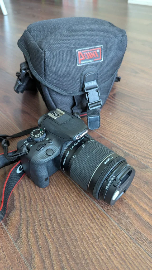 Canon EOS Rebel SL1 DSLR Camera + 18–55mm Lens + Camera Bag image indicator(2)