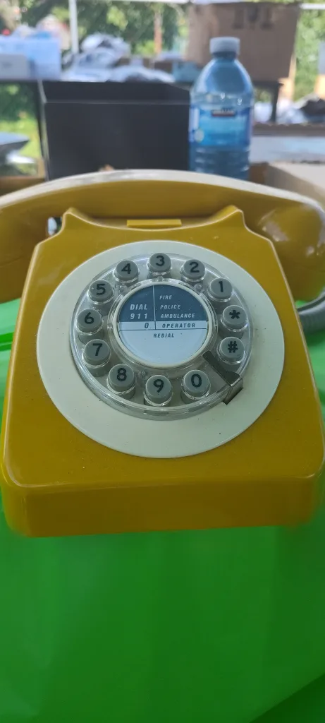 Vintage Yellow Rotary Phone thumbnail