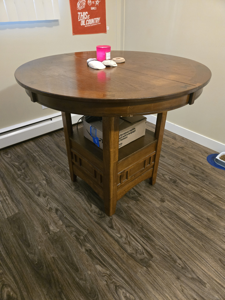 Round wooden dining table