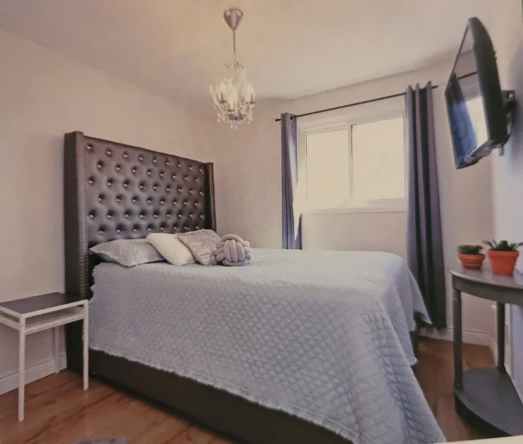 Upholstered Bed Frame with Tufted Headboard thumbnail