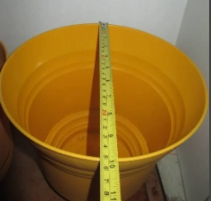 TWO Yellow Plastic Plant Pots with Saucer image indicator(6)