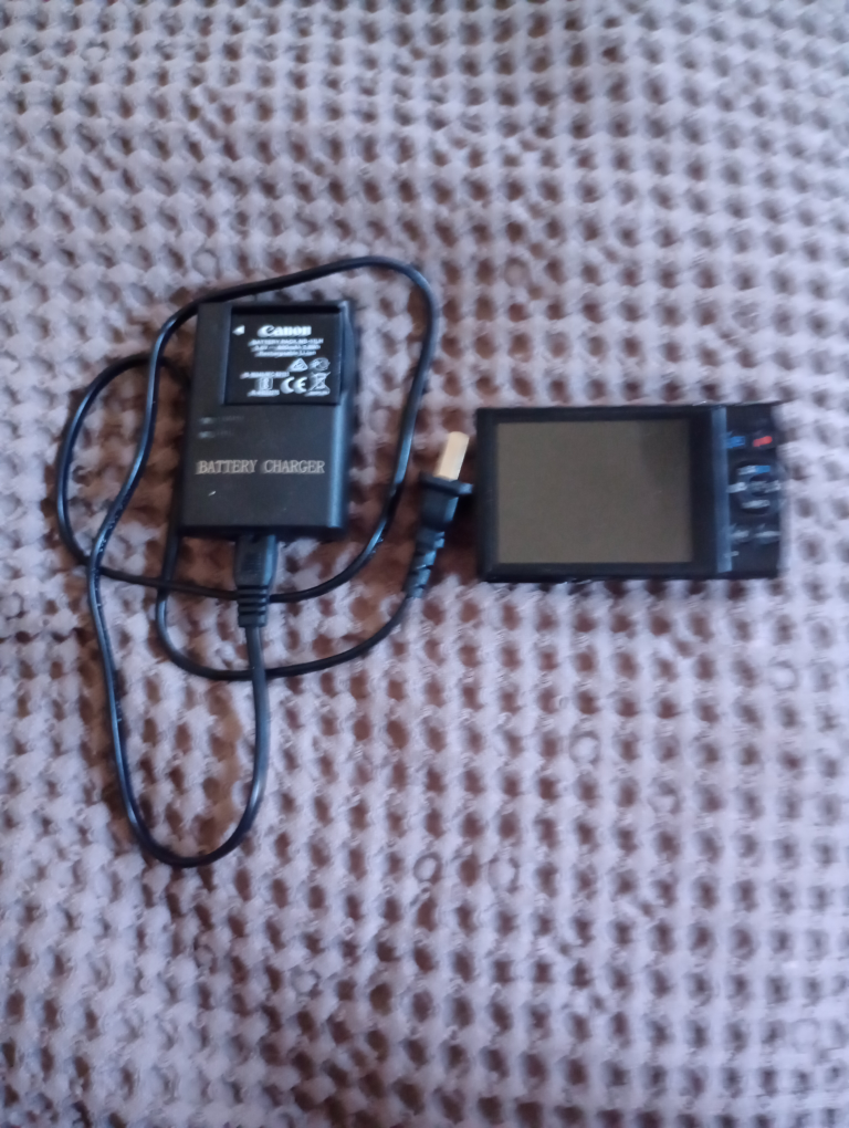 whoever comes first Canon Camera & Battery Charger