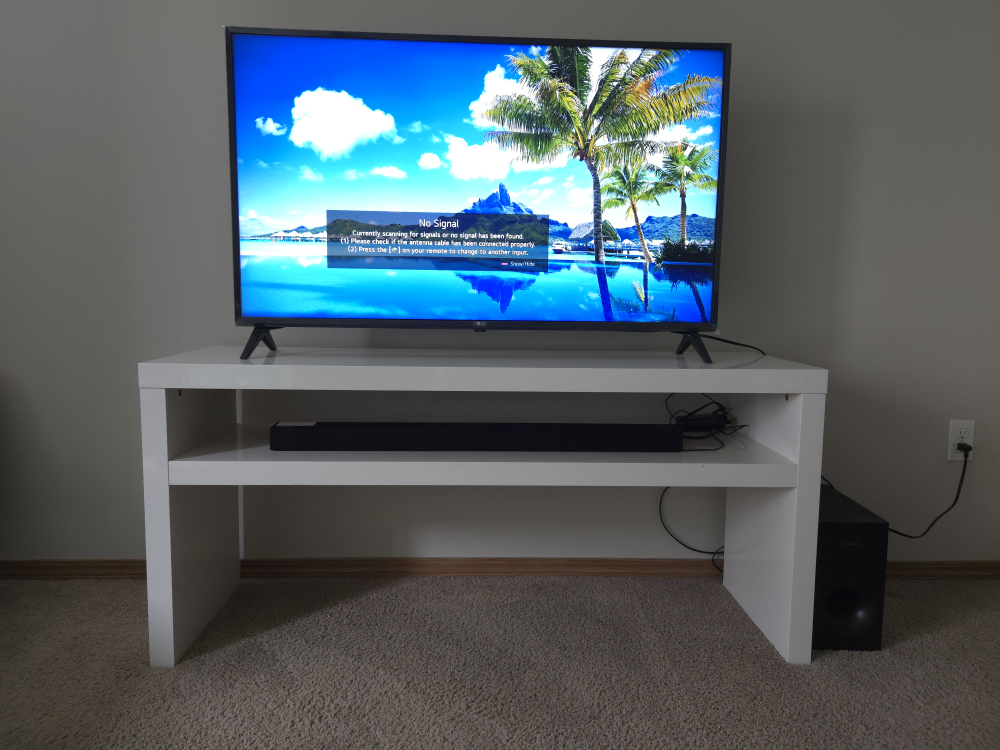 white color TV stand with shelf - photo 2