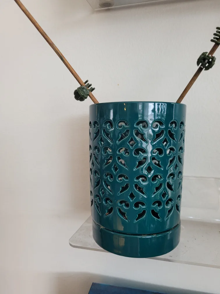 Green Ceramic Planter with Hollow Out Design image indicator(3)