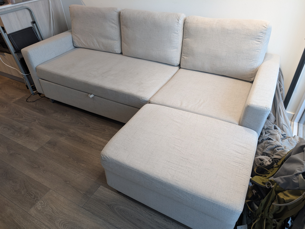 grayish Sofa with Pullout Bed and Storage