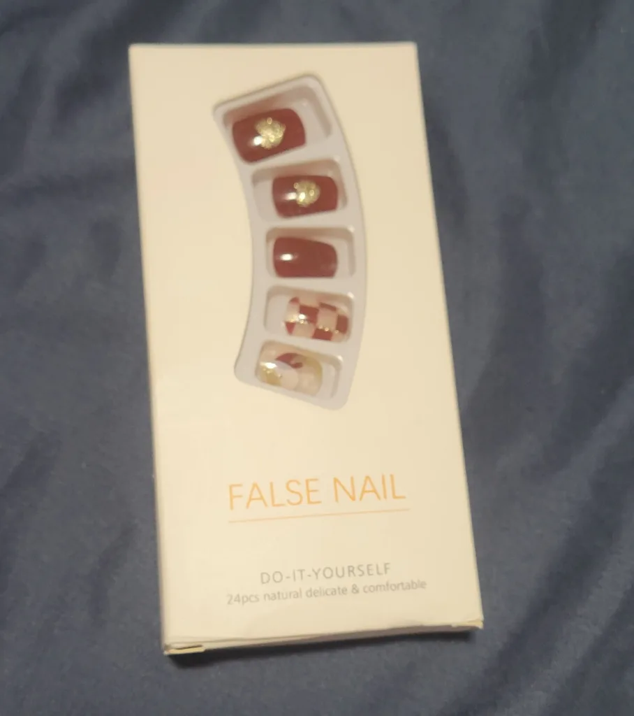 open box of false nails.. 10 nails with gum and applicator stick thumbnail
