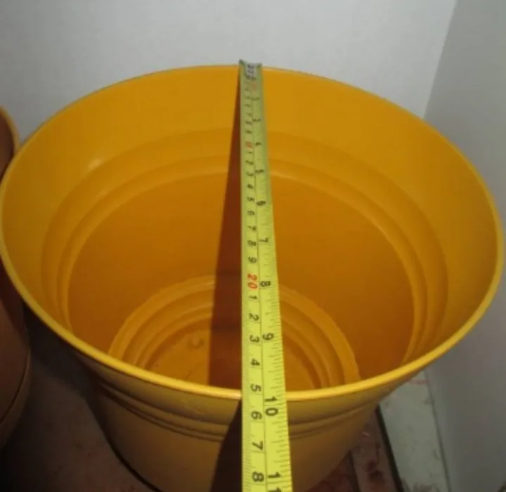TWO Yellow Plastic Plant Pots with Saucer image indicator(7)