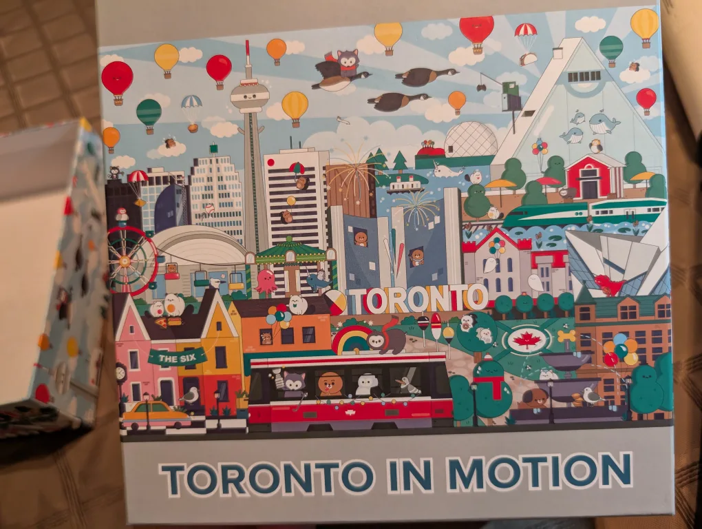 Like New Arcadia 1000 piece Toronto In Motion Jigsaw Puzzle thumbnail