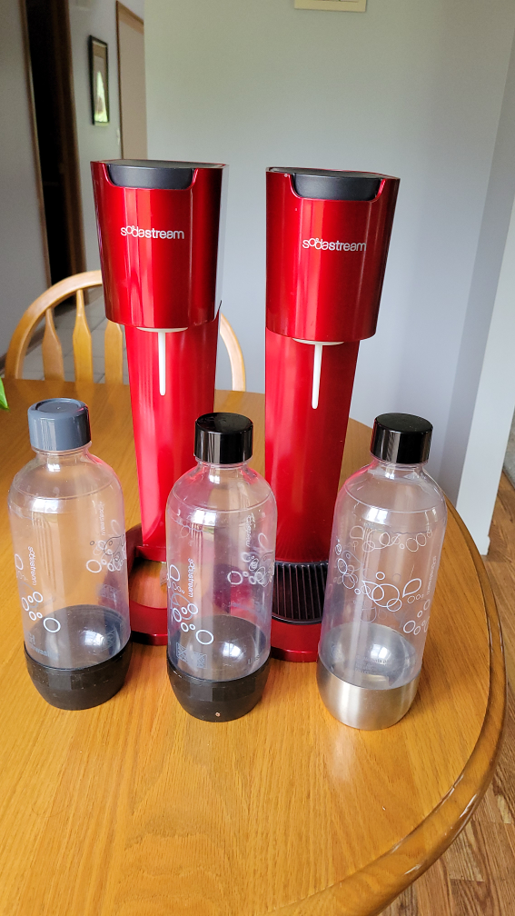 Two SodaStream Machines with Bottles