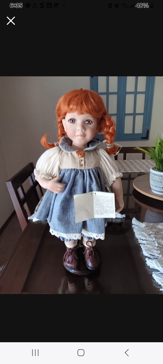 Porcelain Doll with Red Hair