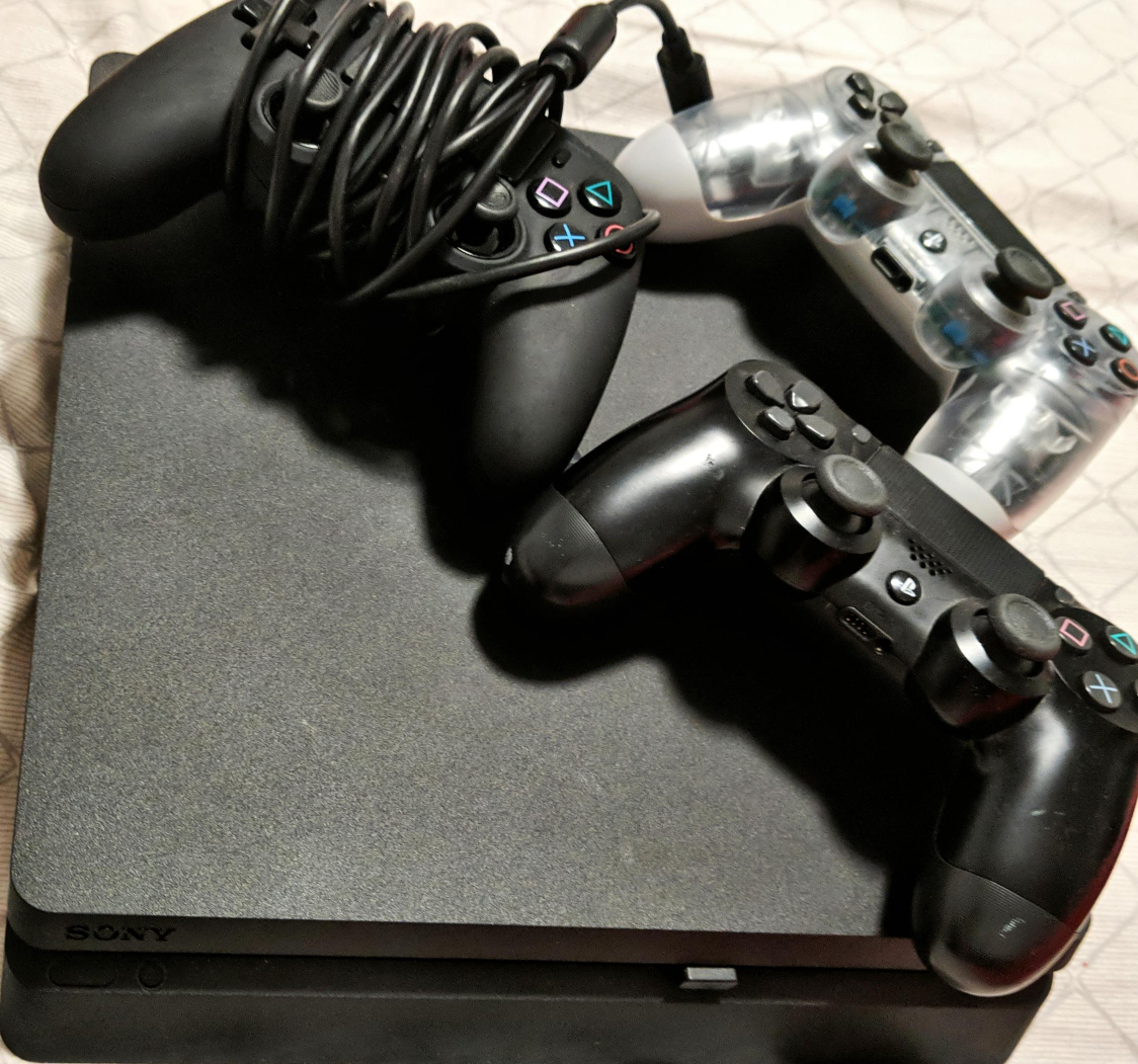 Used PlayStation 4 Console + 3 Controllers