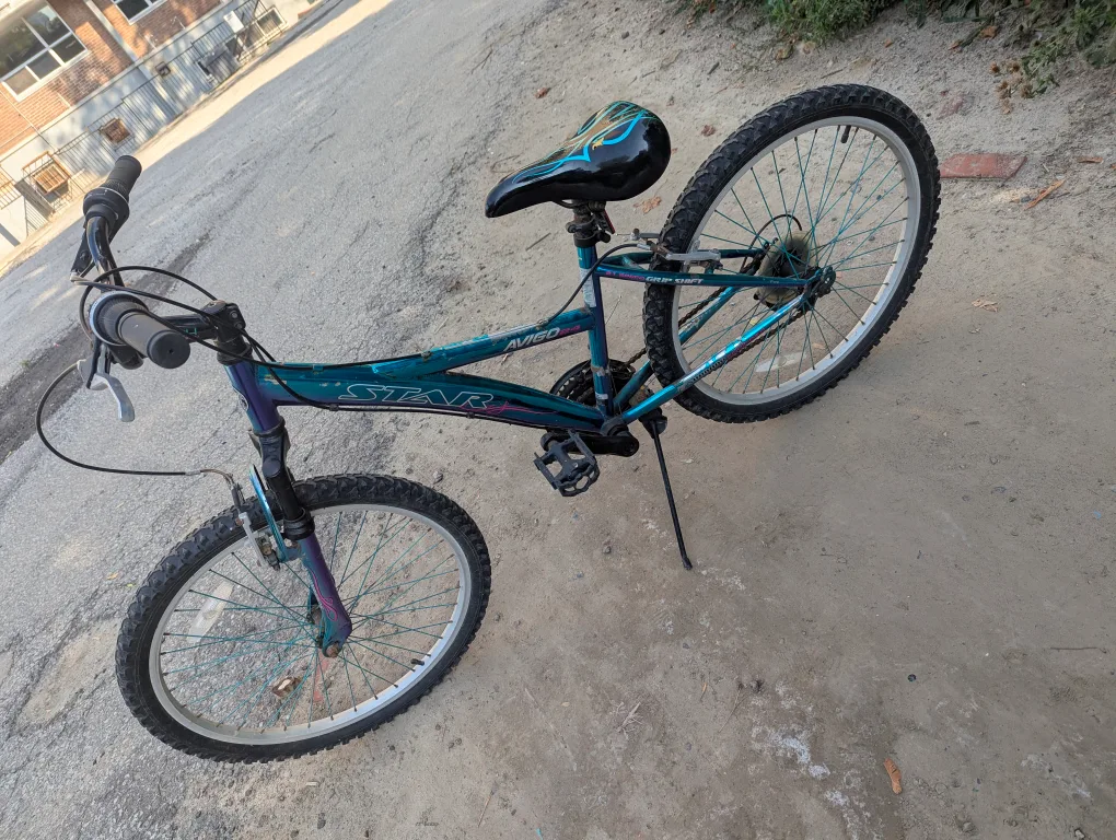youth mountain bike with front shocks. thumbnail