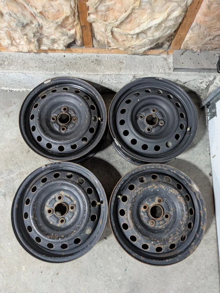 (4)-15 Inch Steel Rims 4x100