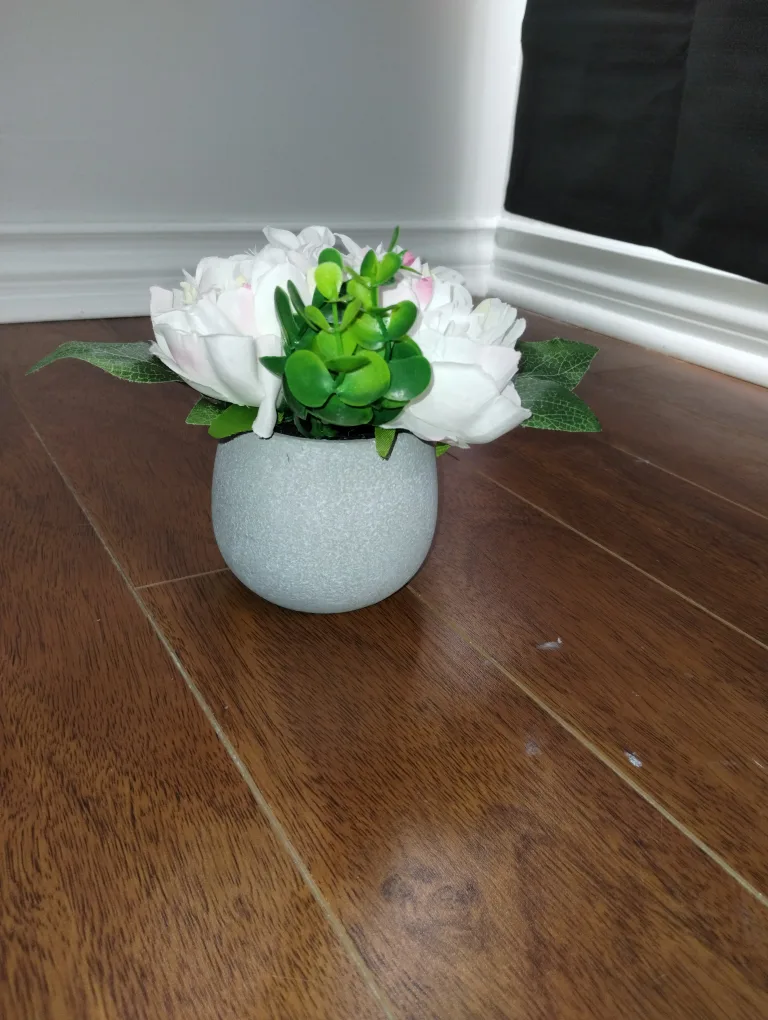 Artificial flowers in gray plaster pot image indicator(3)