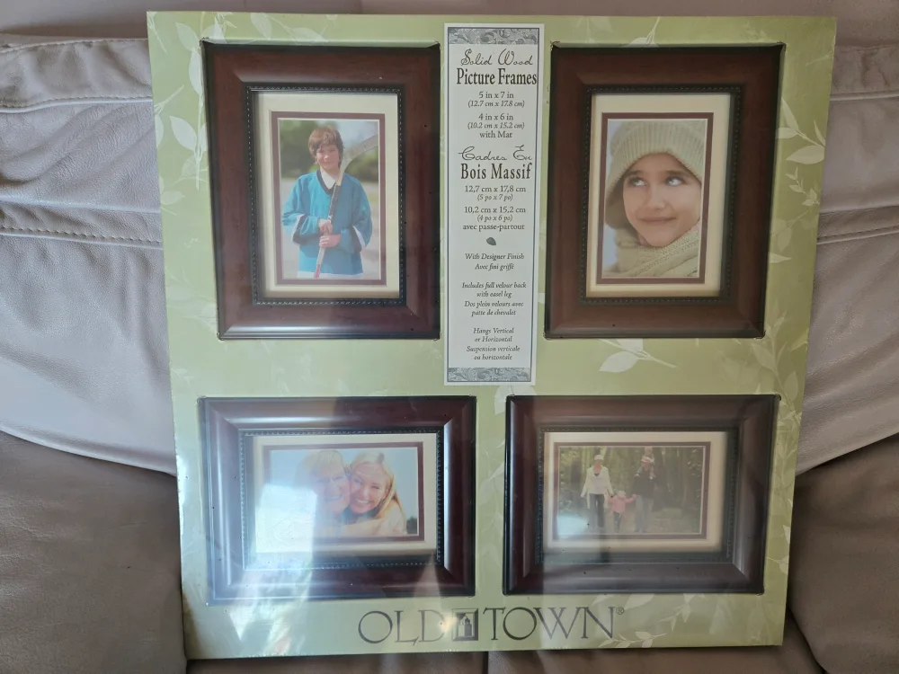 In original packaging. 8 Solid Wood, Beveled, Picture Frames. image indicator(2)