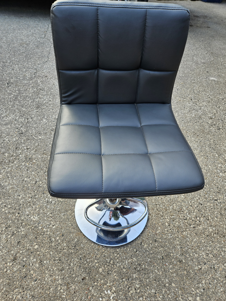 selling the Black seat of a  Swivel Bar Seat Stool