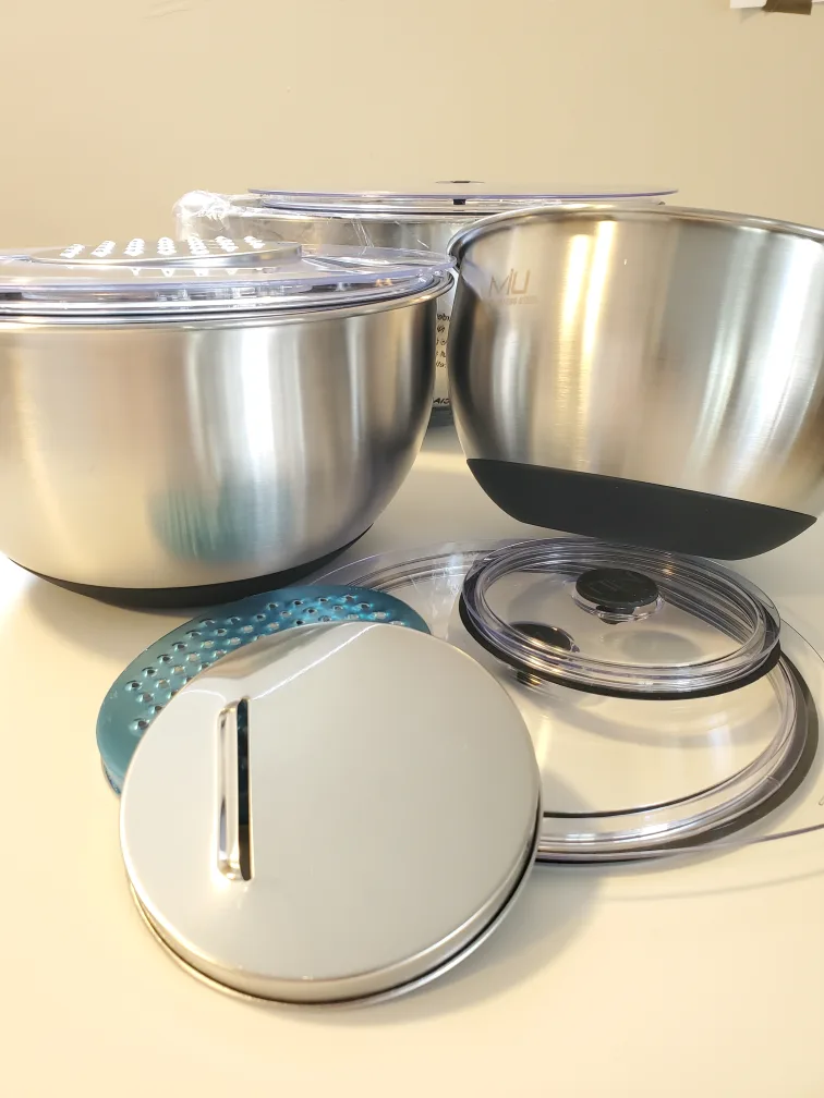 Near new stainless steel mixing bowls with lids image indicator(2)
