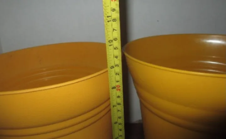 TWO Yellow Plastic Plant Pots with Saucer image indicator(5)