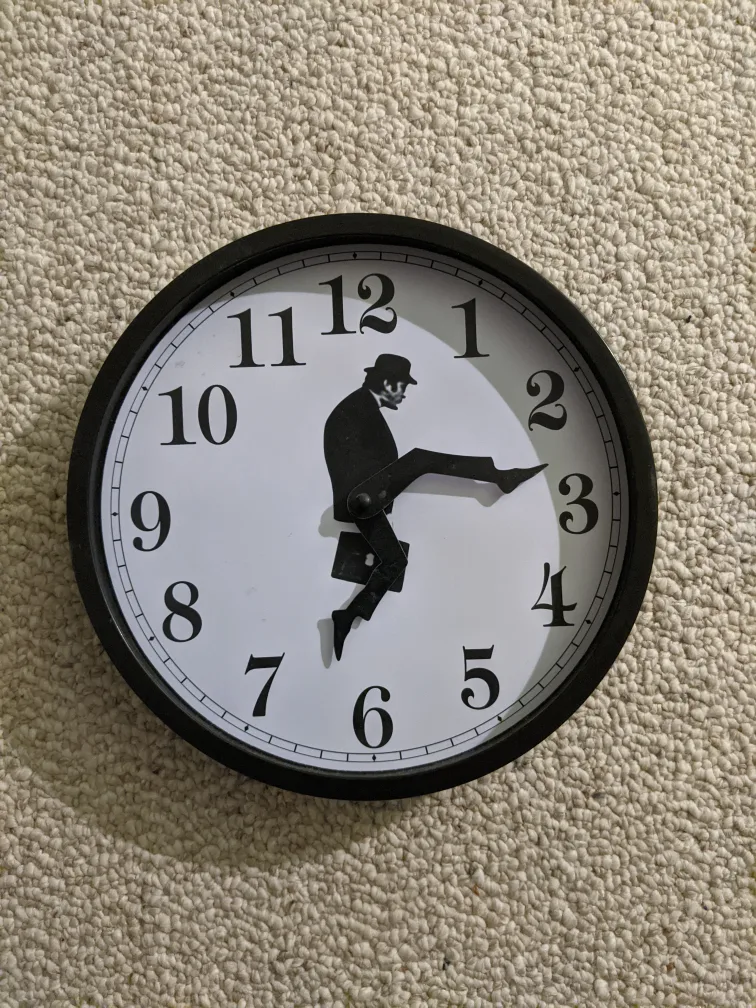 Monty Python silly walk wall clock thumbnail