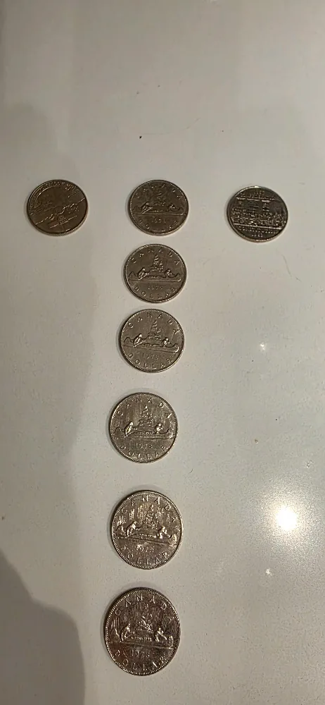 Canadian Dollar Coins - 1975, 1978, 1982, 1984 thumbnail