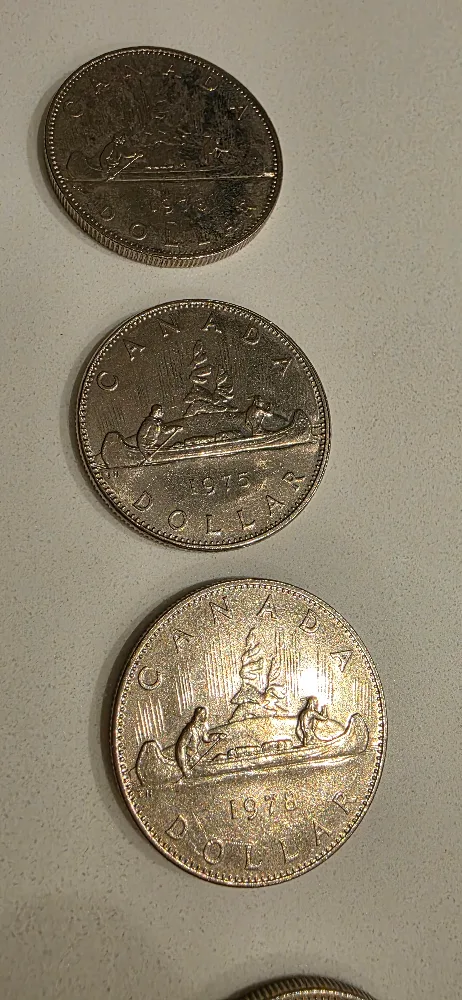 Canadian Dollar Coins - 1975, 1978, 1982, 1984 image indicator(4)