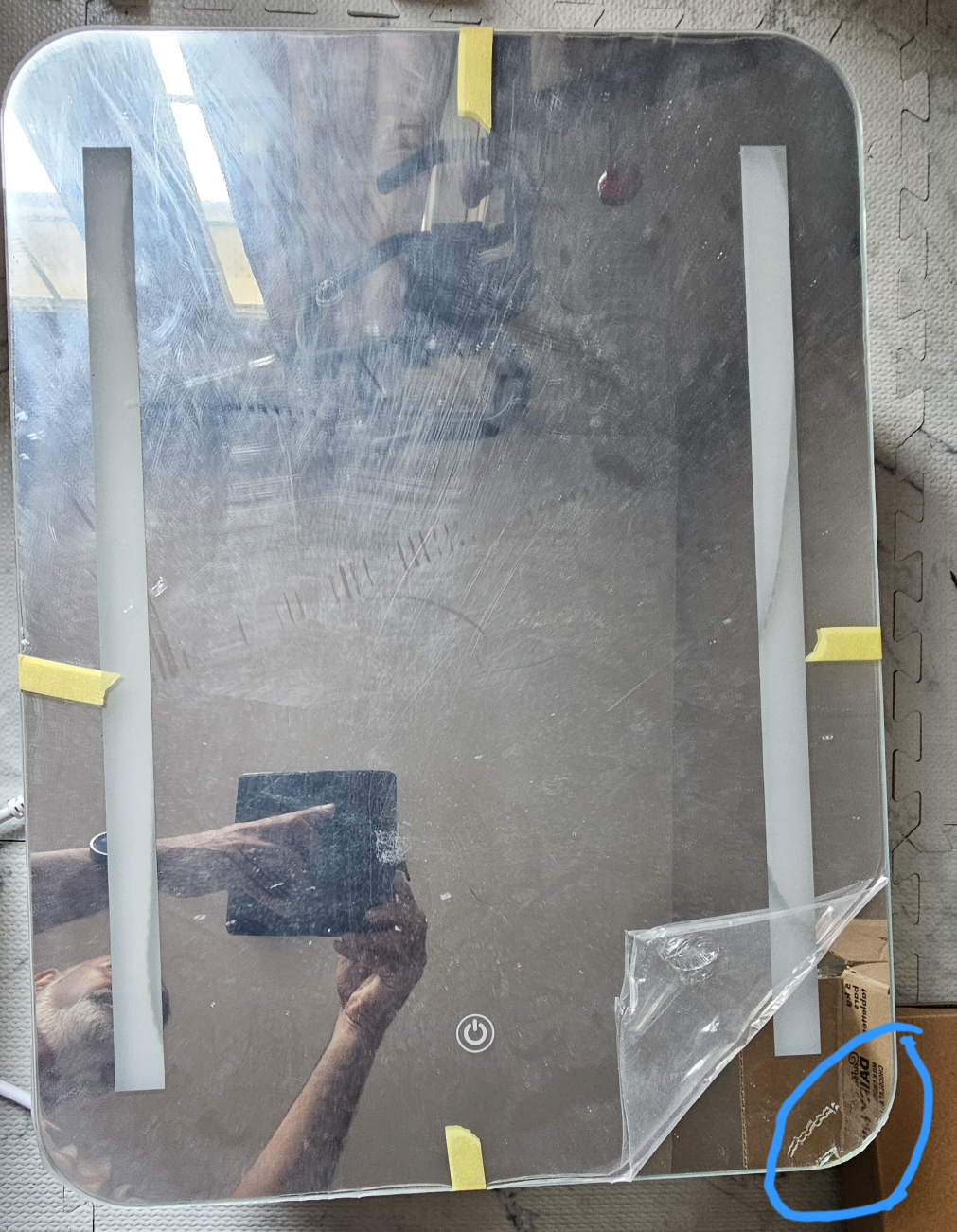 white bathroom cabinet with a slight chip on mirror