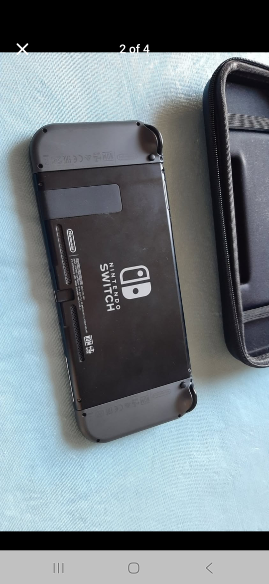 Nintendo Switch Console  +  Extra Joy-Con Pair + Case - photo 2