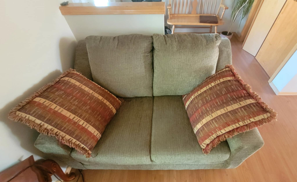 Two Sofas and 1 Love seat .