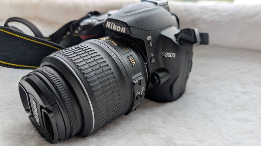 Nikon D3000 Digital Camera with Lens and charge cord