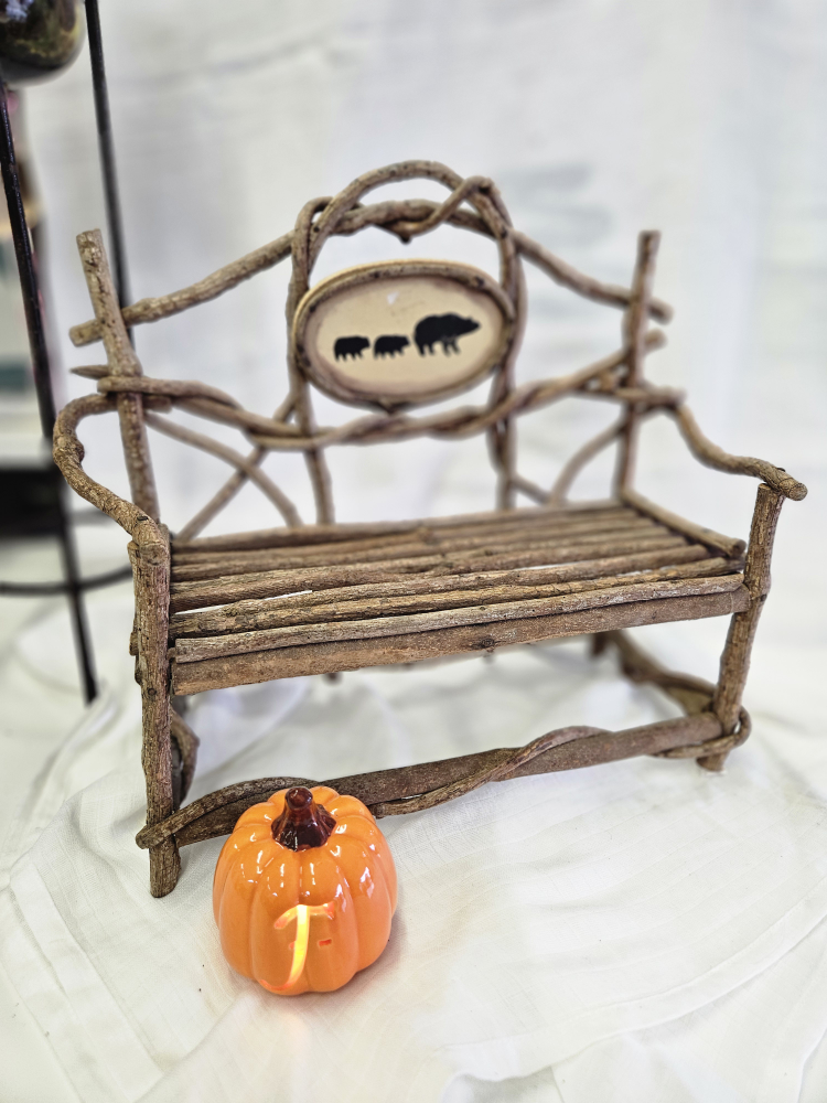 Rustic Wooden Bench with Bear Design