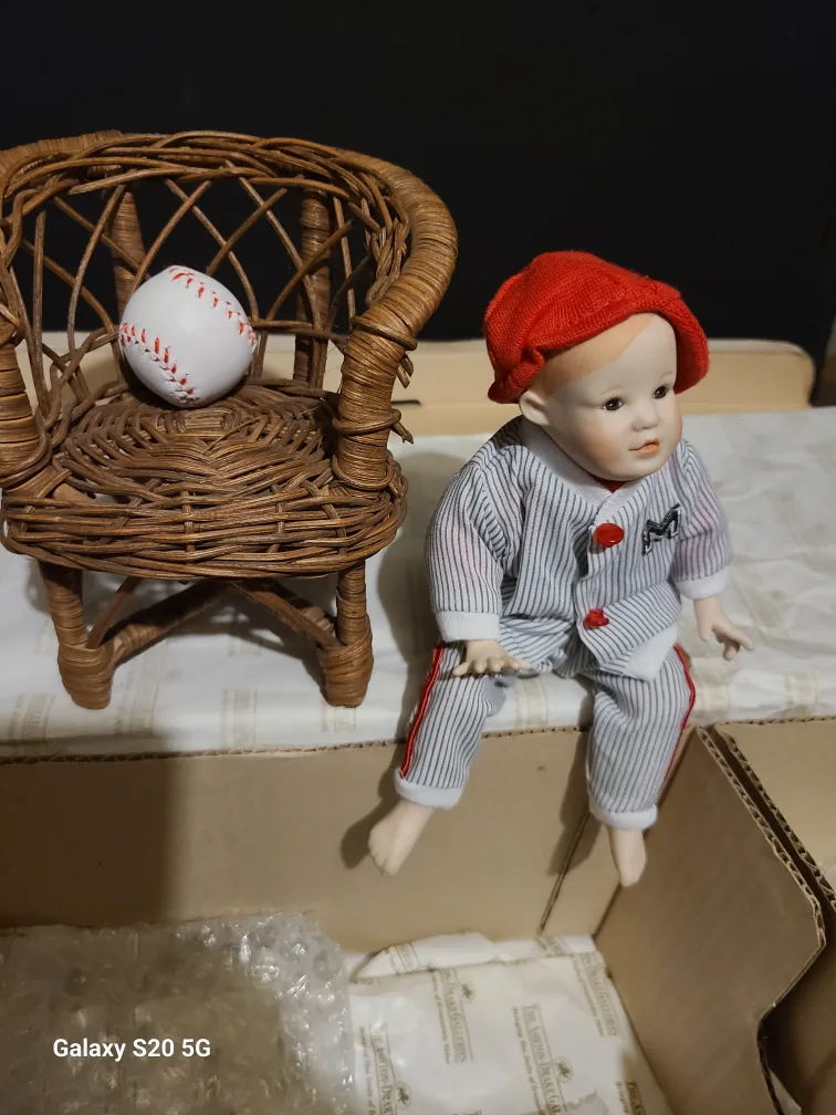 Porcelain Doll with Wicker Chair image indicator(2)