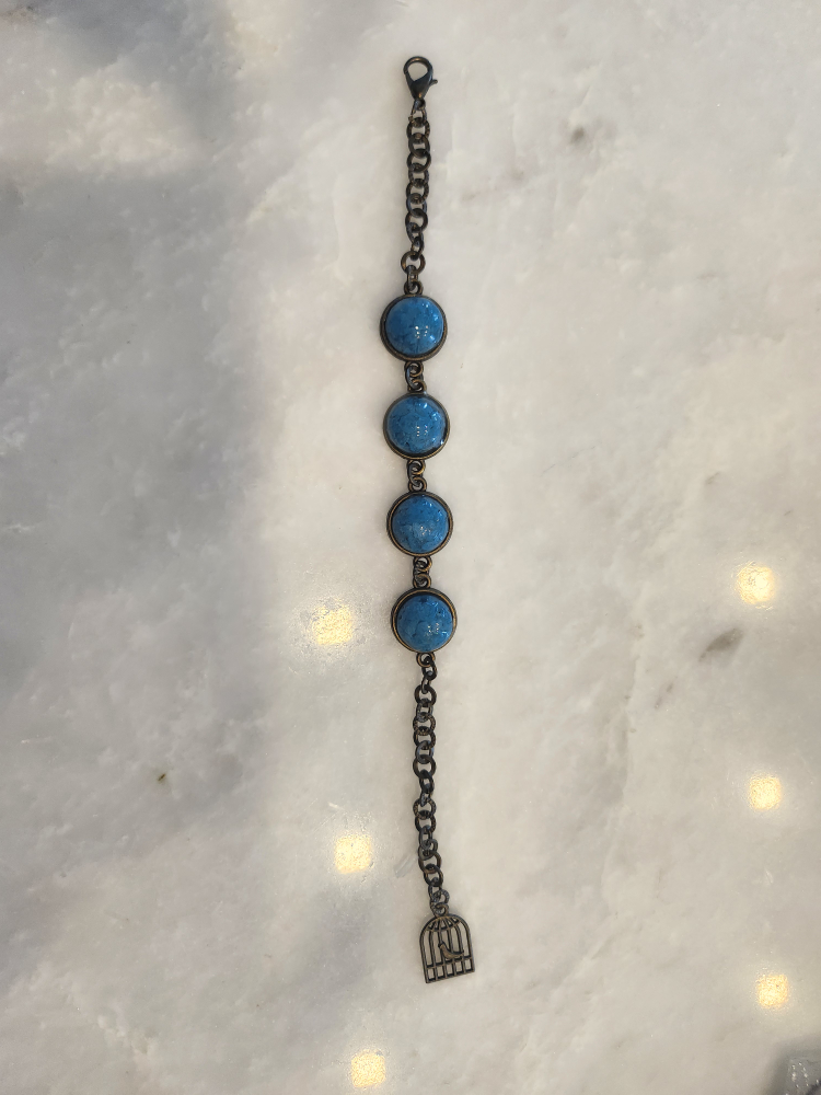 Blue Stone Charm Bracelet with Birdcage Charm