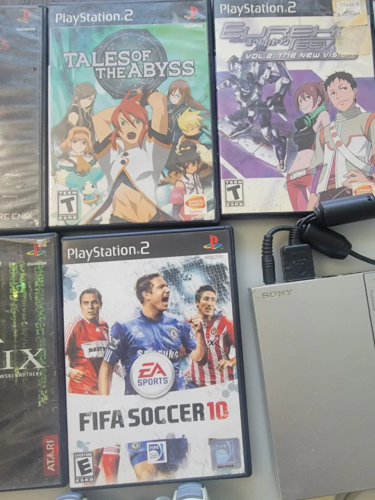 PlayStation 2 console + 7 games image indicator(6)