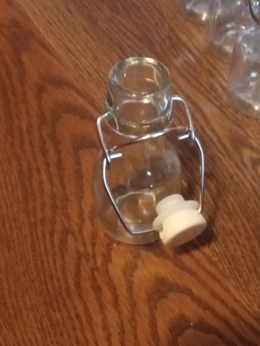 Mini Glass Bottles with Stoppers image indicator(3)