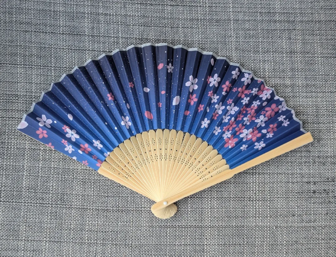Japanese paper folding fan with Sakura design thumbnail