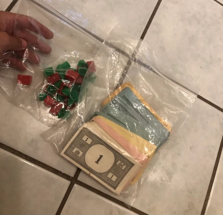 Extra Monopoly pieces and money thumbnail