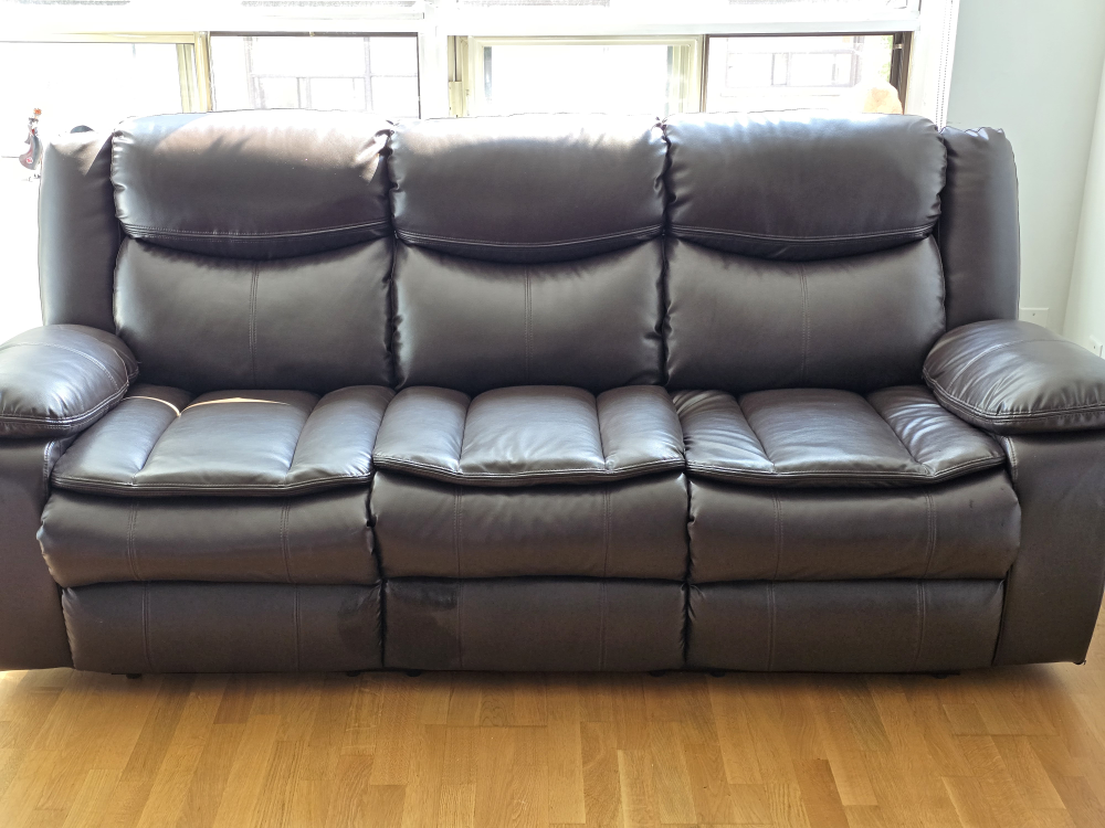 Brown Leather Reclining Sofa (price negotiable)