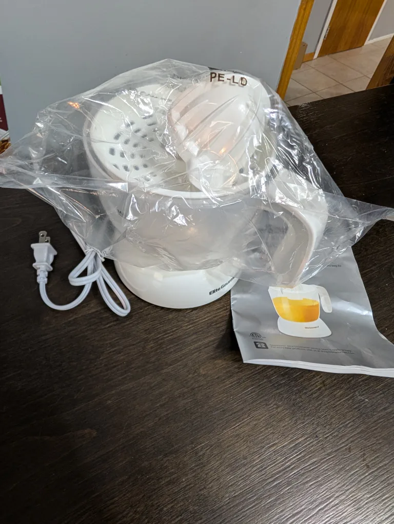 Elite Gourmet 2-Cup Capacity Citrus Juicer - New image indicator(2)