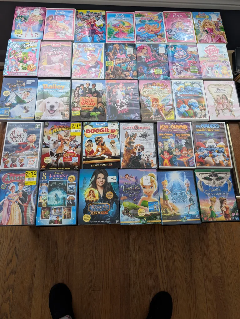 Mixed Lot of Kids' DVDs - Barbie, Tinkerbell, and More!