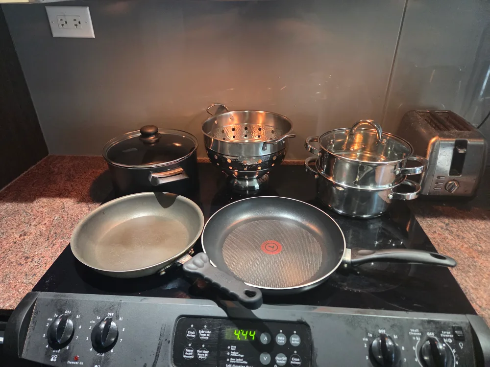 Cookware, pots, pans, steamer and colander thumbnail