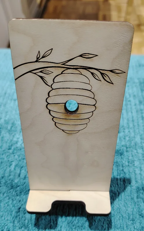 Wooden Phone Stand with Beehive Design image indicator(3)