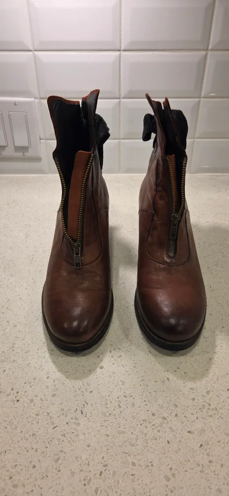 Casta  Brown Leather Ankle Boots with black bow image indicator(2)