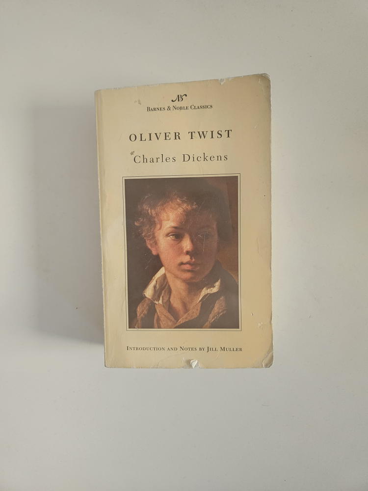 Oliver Twist by Charles Dickens 🧡
