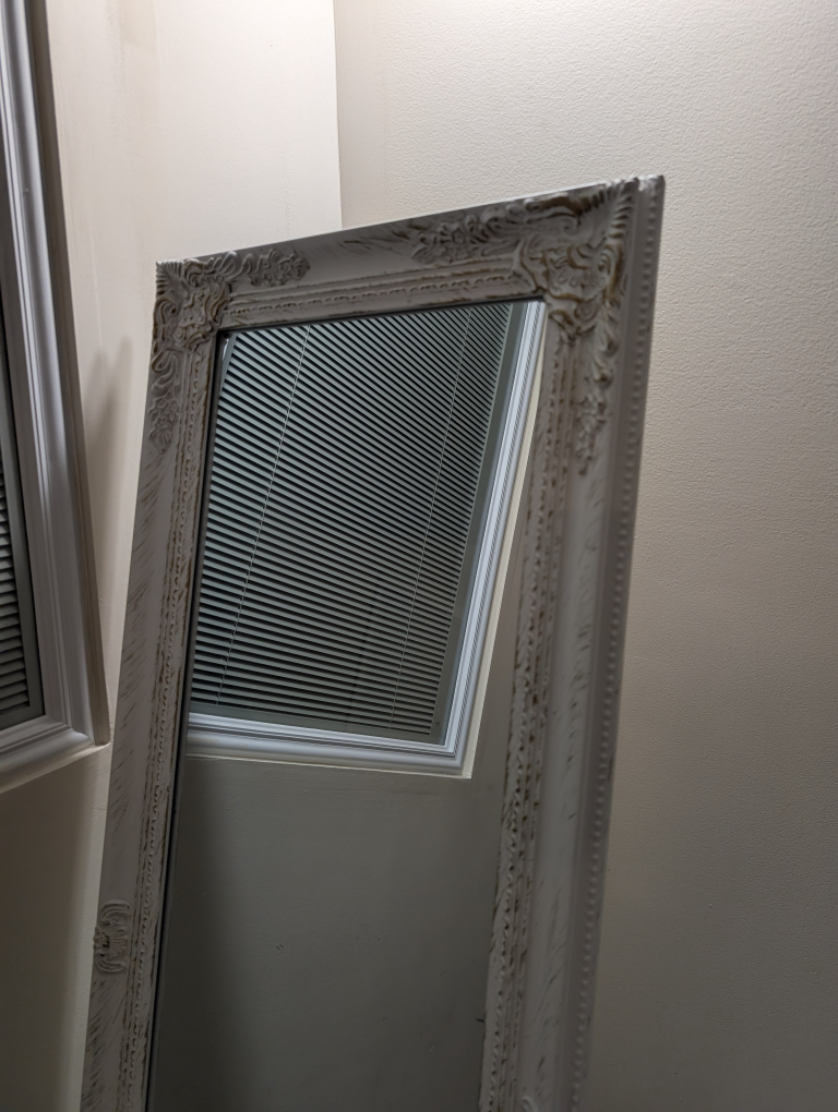 Standing Mirror with Ornate White Frame