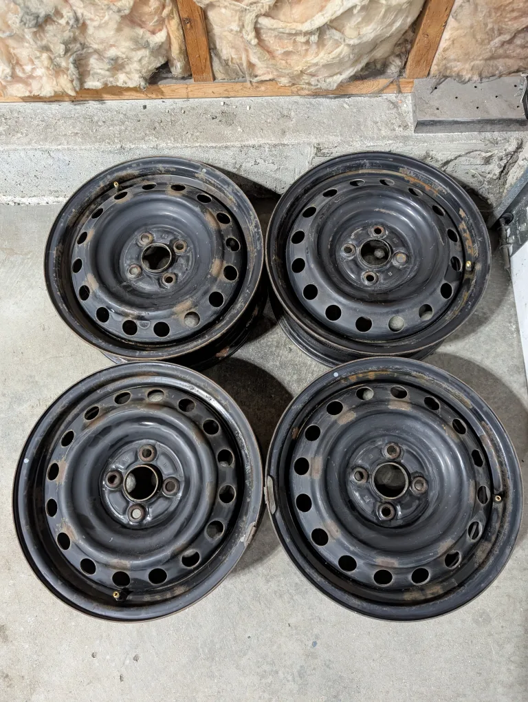(4)-15 Inch Steel Rims 4x100 Off Toyota