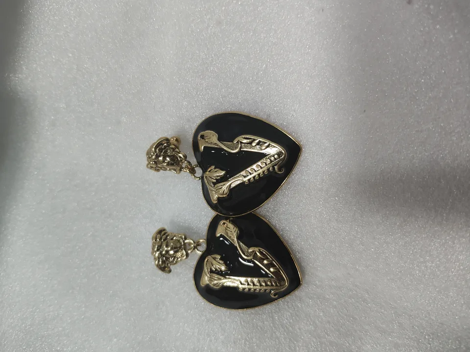 Versace Heart Drop Earrings (Sales) image indicator(2)