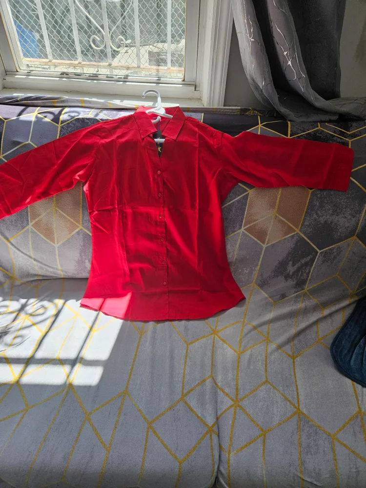 Button-Down Shirt each shirt $10 image indicator(6)