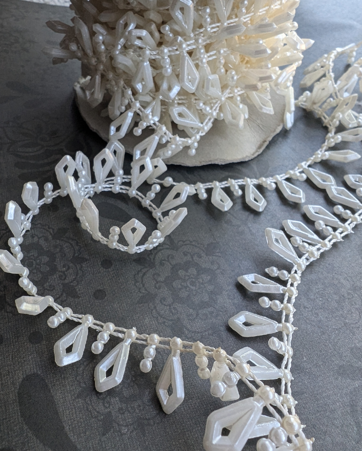 Roll of plastic faux pearl beaded trim - 6 yards